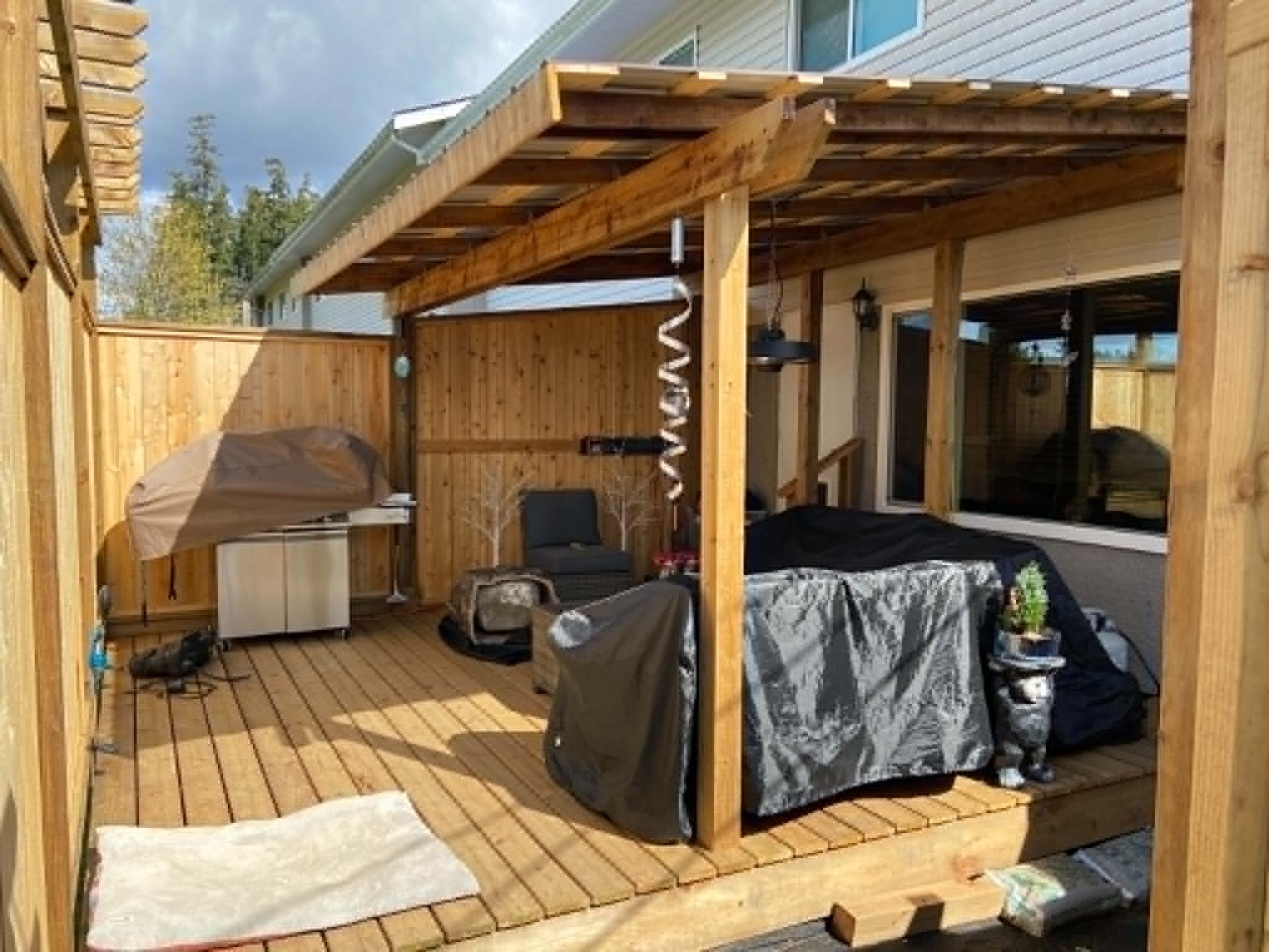 A fencing installation done by West Coast Fencing, displayed as a work sample.