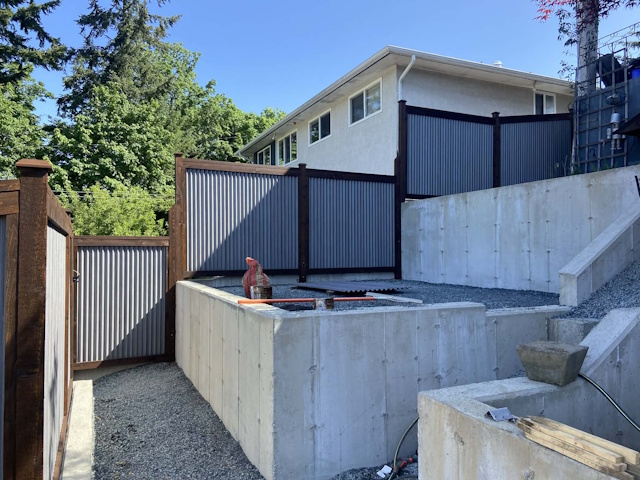 A fencing installation done by West Coast Fencing, displayed as a work sample.