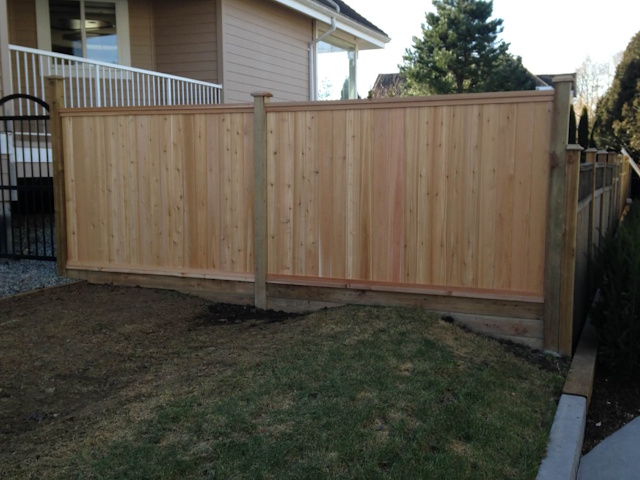 A fencing installation done by West Coast Fencing, displayed as a work sample.