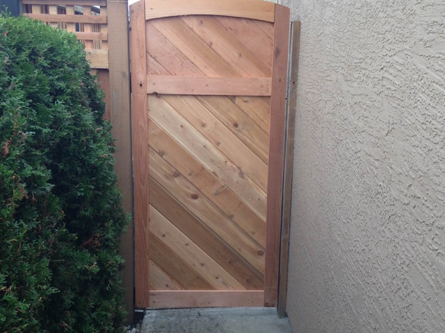 A fencing installation done by West Coast Fencing, displayed as a work sample.
