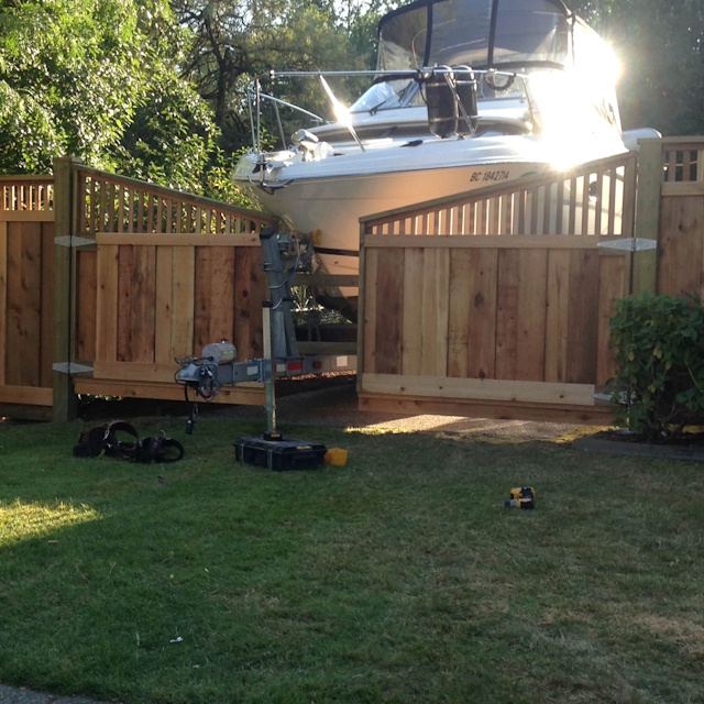 A fencing installation done by West Coast Fencing, displayed as a work sample.
