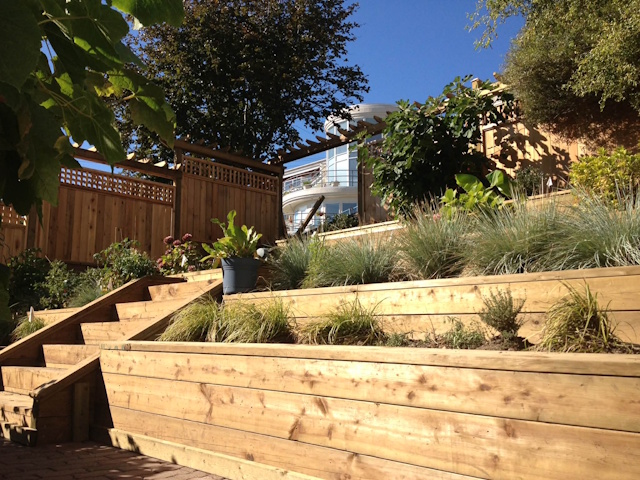 A fencing installation done by West Coast Fencing, displayed as a work sample.