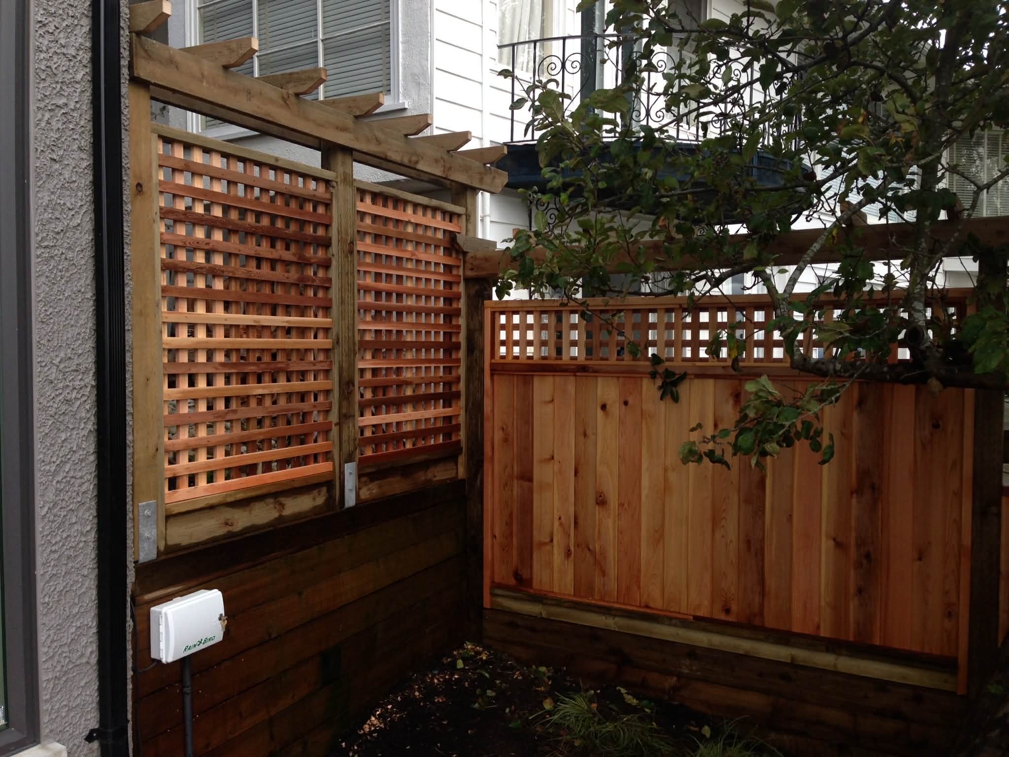 A fencing installation done by West Coast Fencing, displayed as a work sample.